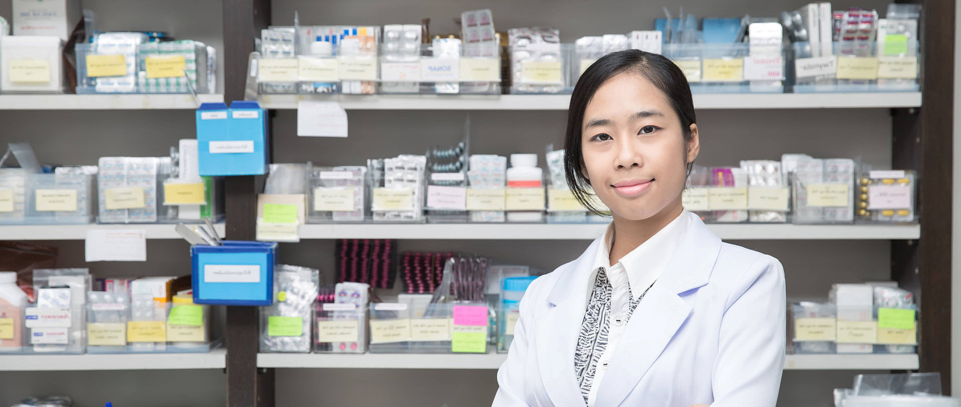 female pharmacist standing