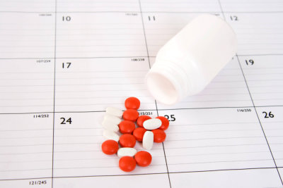 pills placed on a calendar